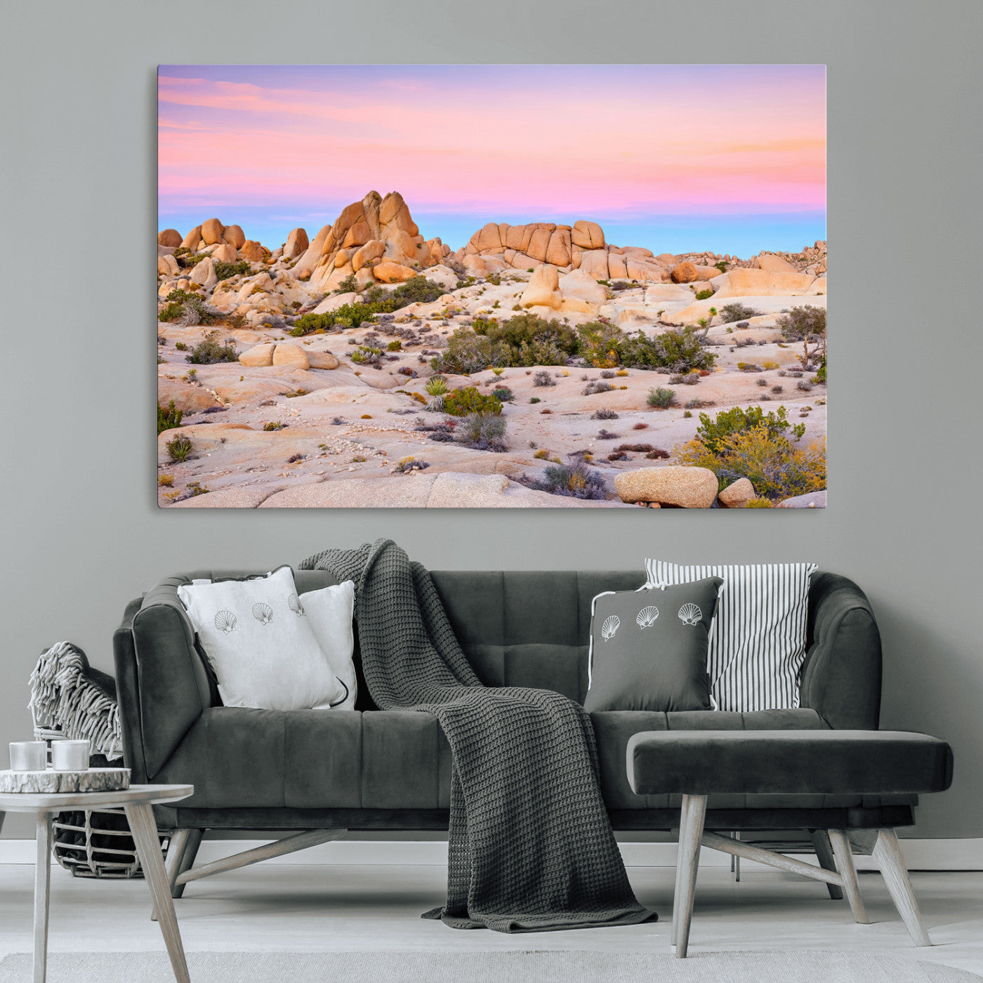 A breathtaking desert landscape featuring rugged rock formations under a vibrant pastel sunset sky, capturing the warmth and serenity of a Southwestern wilderness.