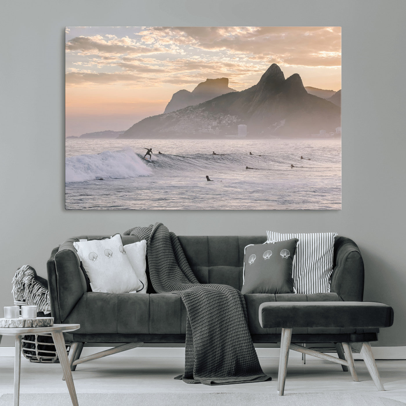 A surfer rides a golden hour wave near misty coastal mountains, surrounded by fellow surfers, capturing the spirit of a coastal adventure.