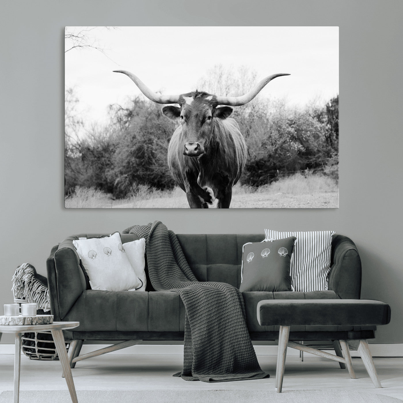 Black and white photo of a Longhorn cow facing camera, ideal for rustic, farmhouse, or western-themed home wall decor.