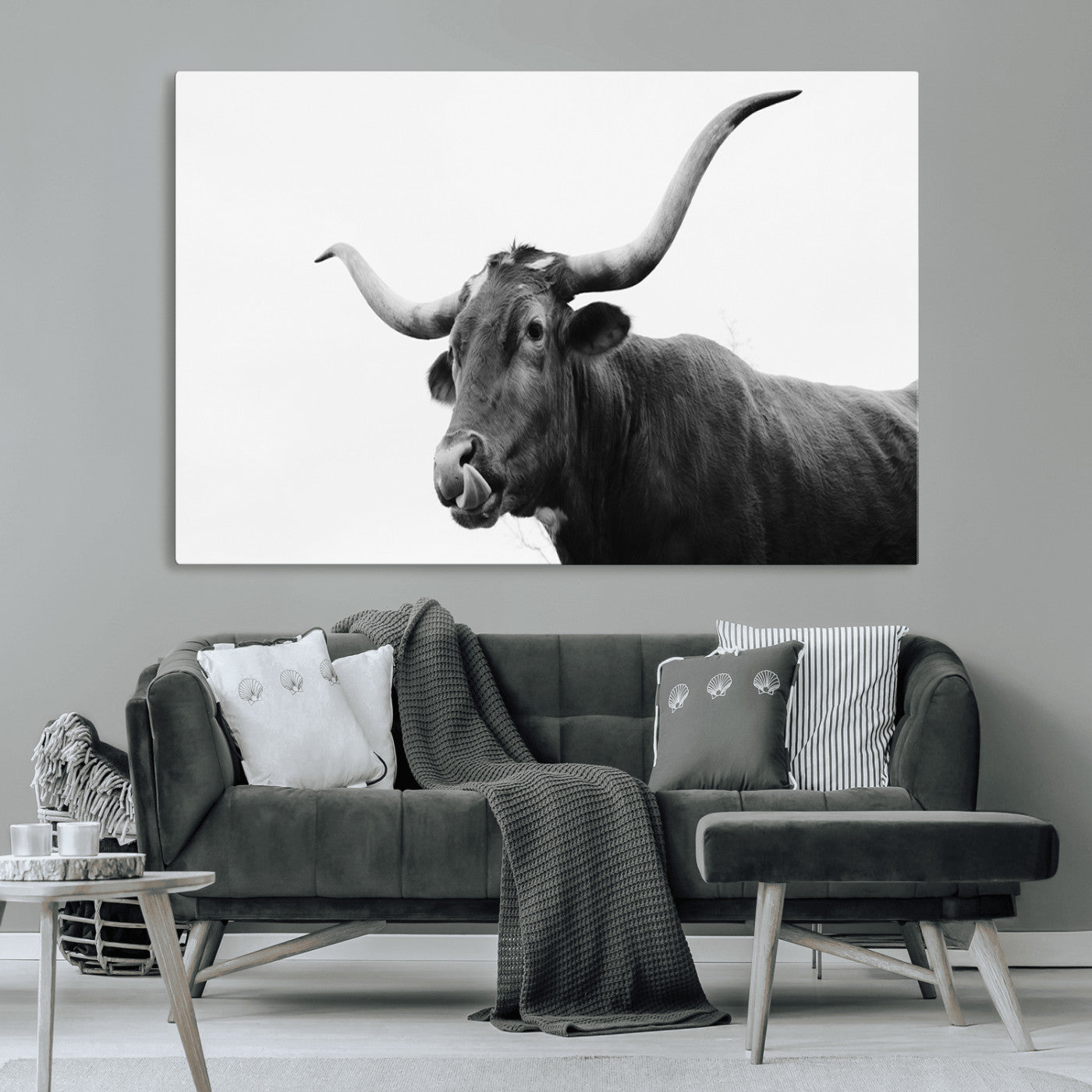 Black and white photo of a Texas Longhorn cow with curved horns, ideal for rustic, western or minimalist style home decor.