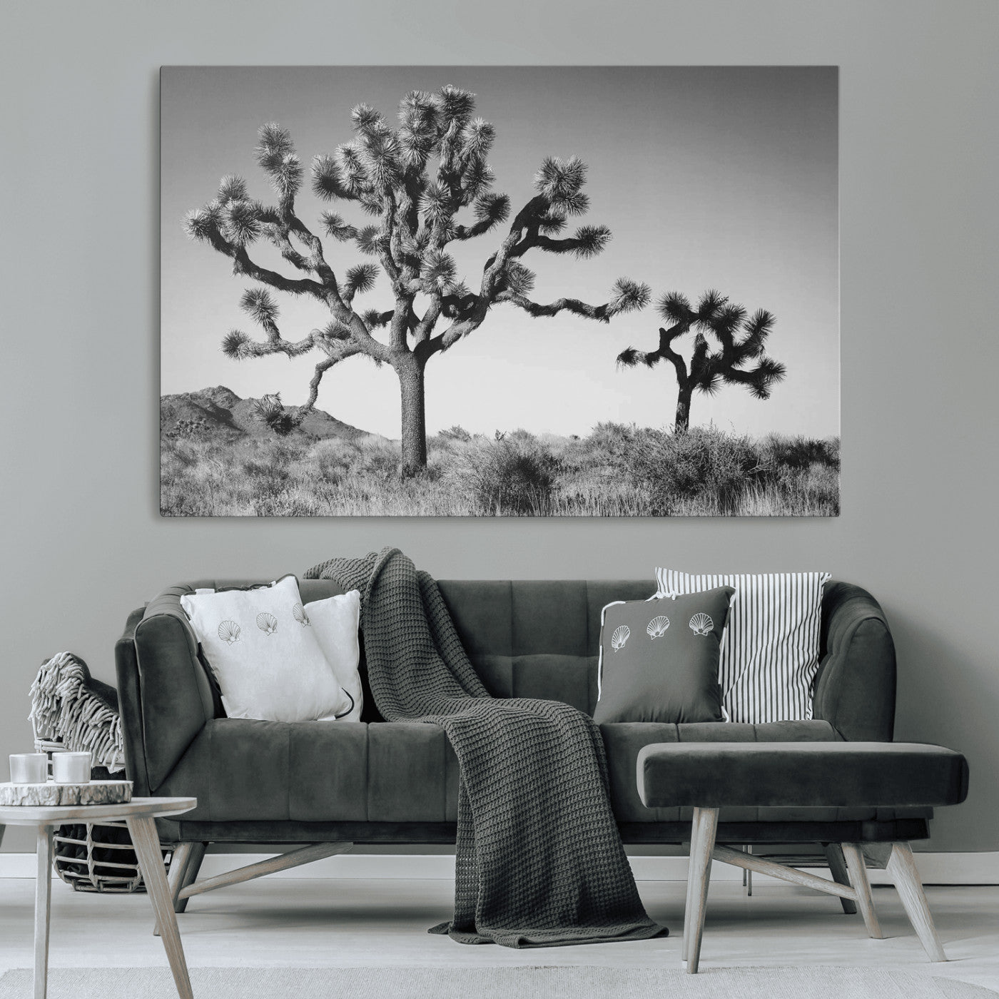 Black and white desert scene with two Joshua trees under clear sky, perfect for rustic or boho-inspired home decor.
