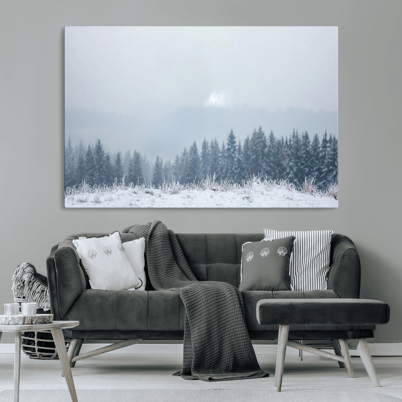 Snow-covered forest under misty sky, soft light breaking through clouds, ideal for minimalist or Nordic-inspired home decor.