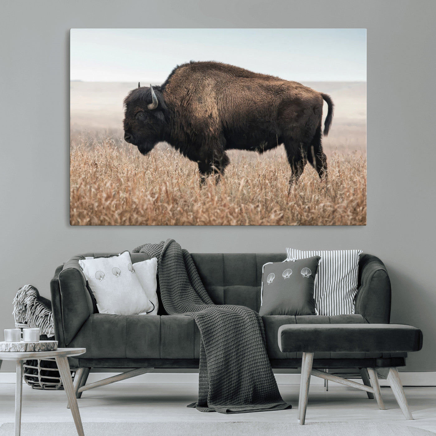 A lone bison stands in a vast prairie under a soft sky, evoking freedom and rustic charm for western or farmhouse inspired interiors.