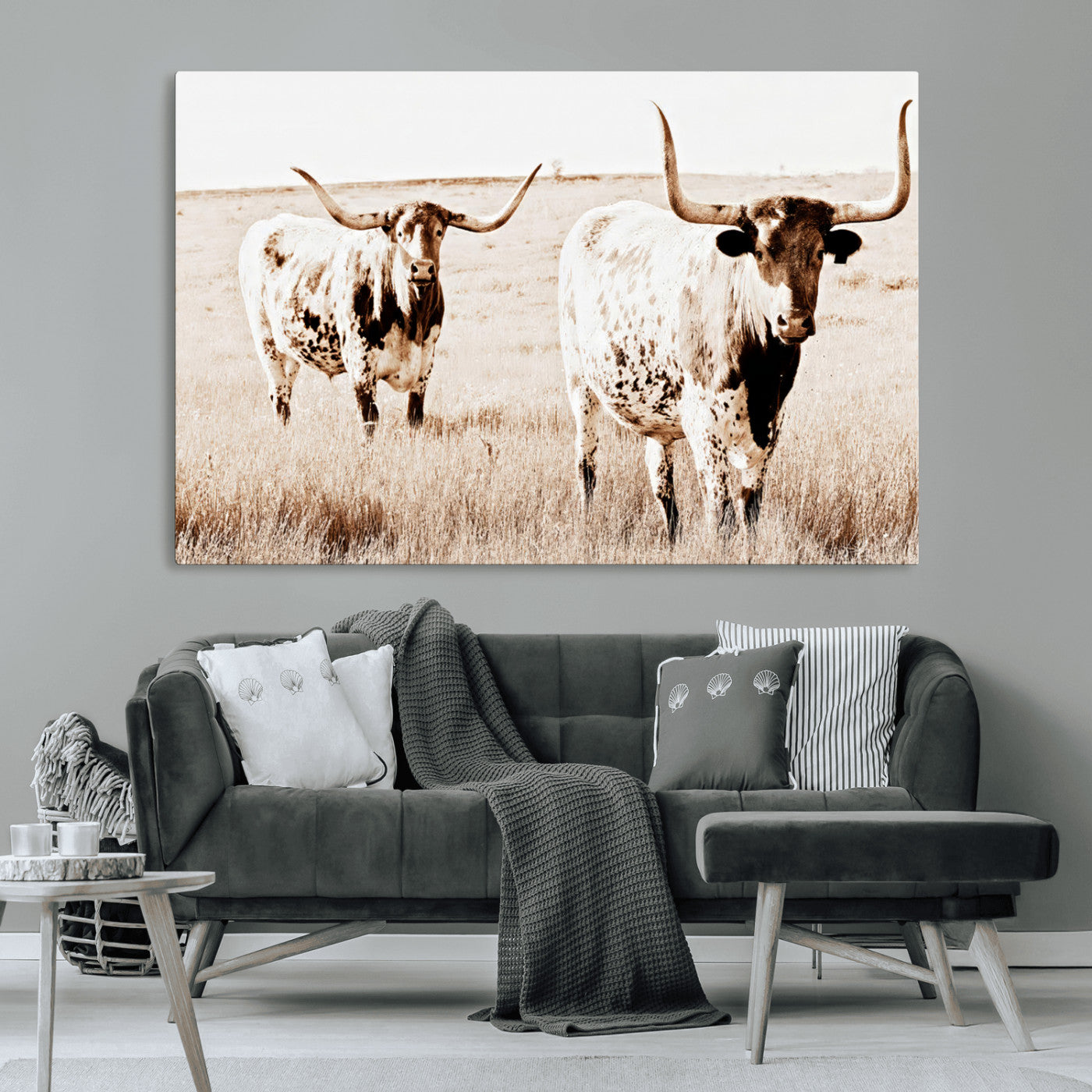 Two Texas longhorn cows standing in a sepia-toned pasture, evoking rustic charm perfect for farmhouse or western country interiors. (