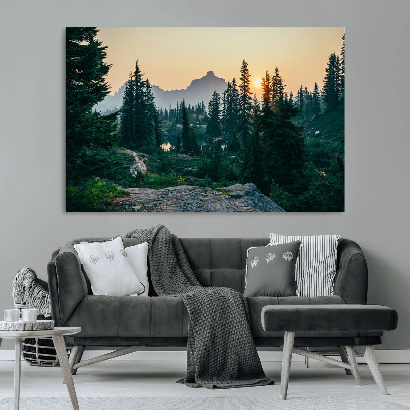 Mountain landscape with evergreen trees at sunset, casting a golden glow over the wilderness, creating a peaceful and rustic nature scene.