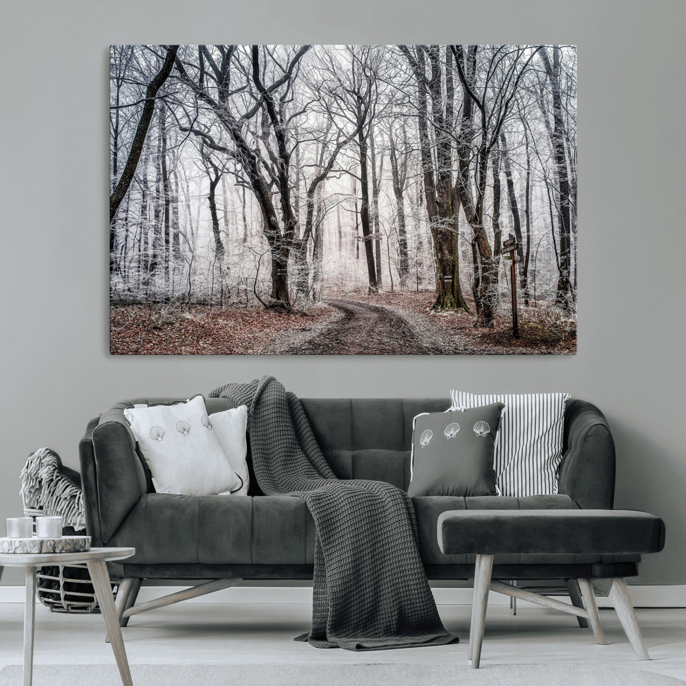 Snow-covered trees in a misty winter forest with a winding path, creating a serene and mysterious atmosphere, perfect for nature-inspired wall art.
