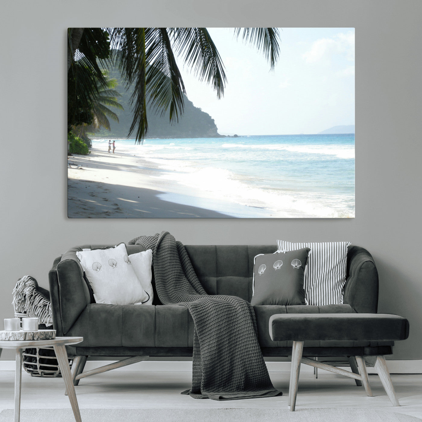 Tropical beach with palm tree shadows, white sand, and turquoise ocean waves, creating a serene and relaxing island escape atmosphere.