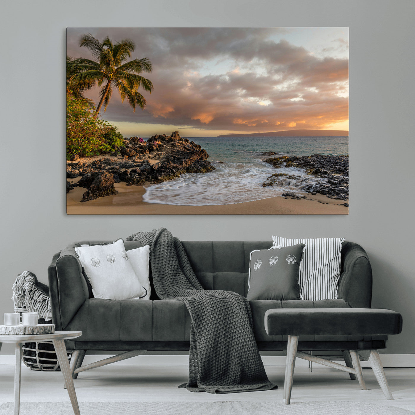 Golden sunset over a tropical beach with palm trees, rocky shoreline, and gentle ocean waves, perfect for coastal and island-inspired decor.
