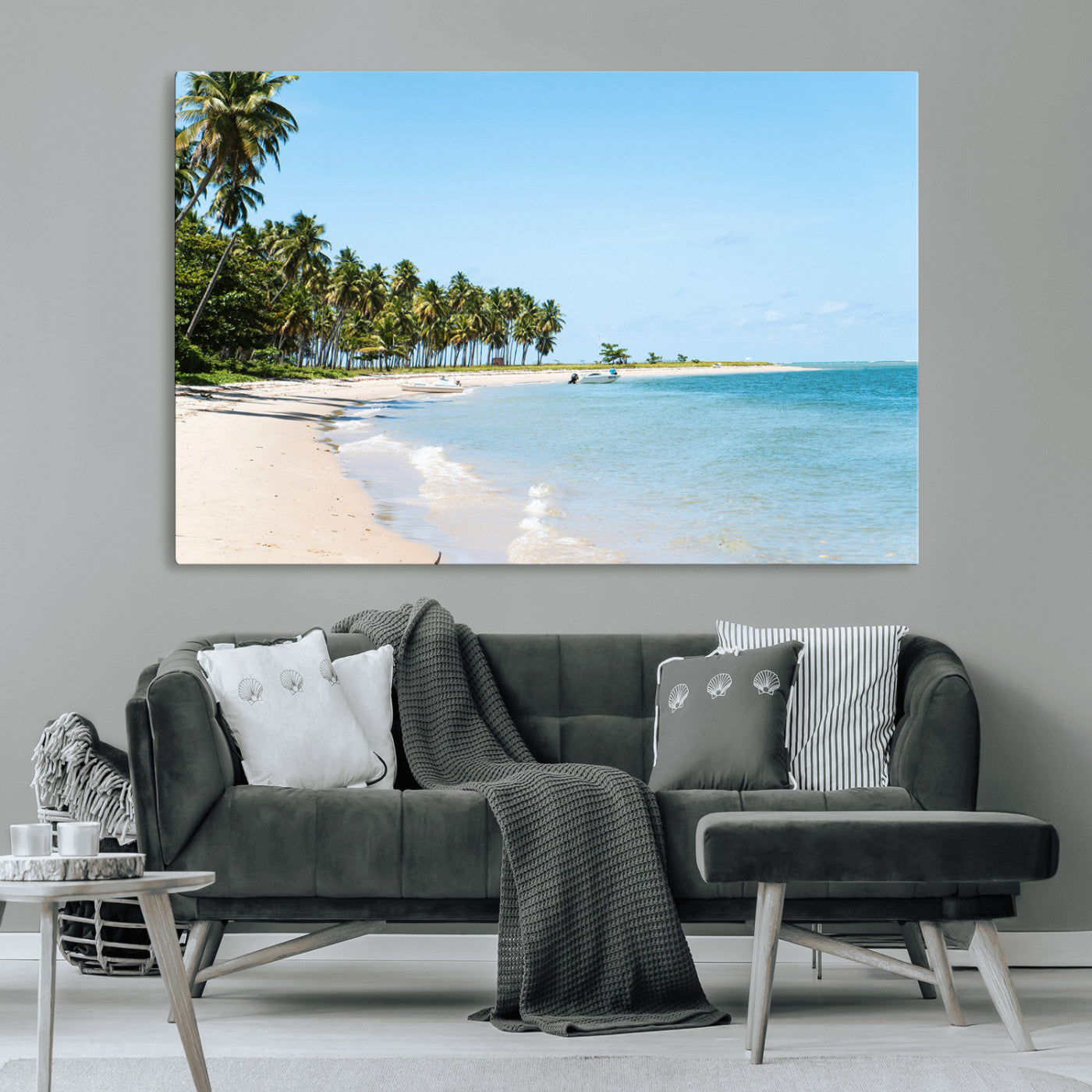 A serene tropical beach with clear blue water, soft sand, and lush palm trees under a bright sky, creating a peaceful island paradise atmosphere.