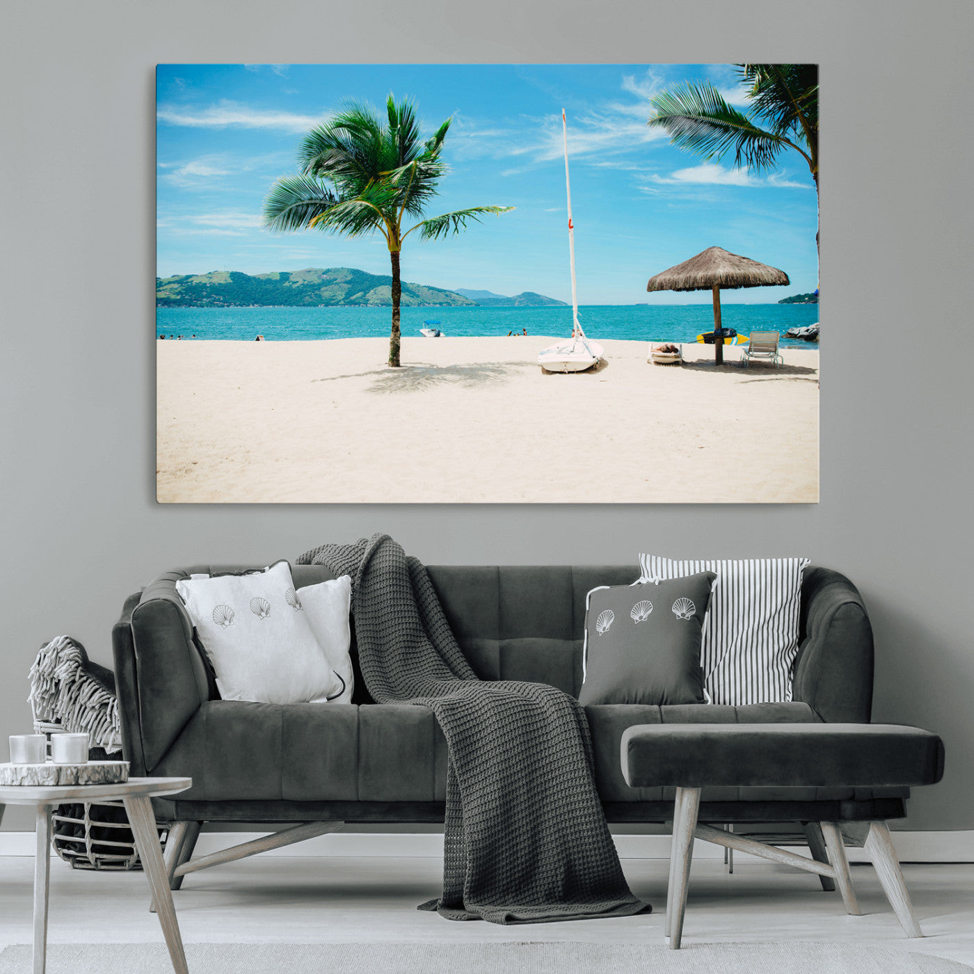 Tropical beach scene with palm trees, a white sailboat, and turquoise ocean waters under a bright blue sky, creating a peaceful summer vibe.