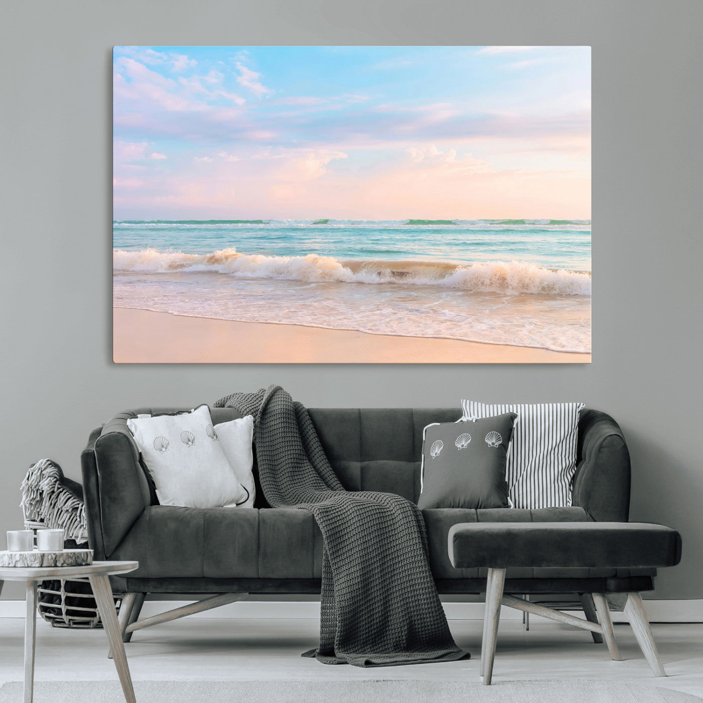 A peaceful beach scene with soft pastel skies, gentle waves washing up on the sandy shore, creating a calm and serene ocean view.