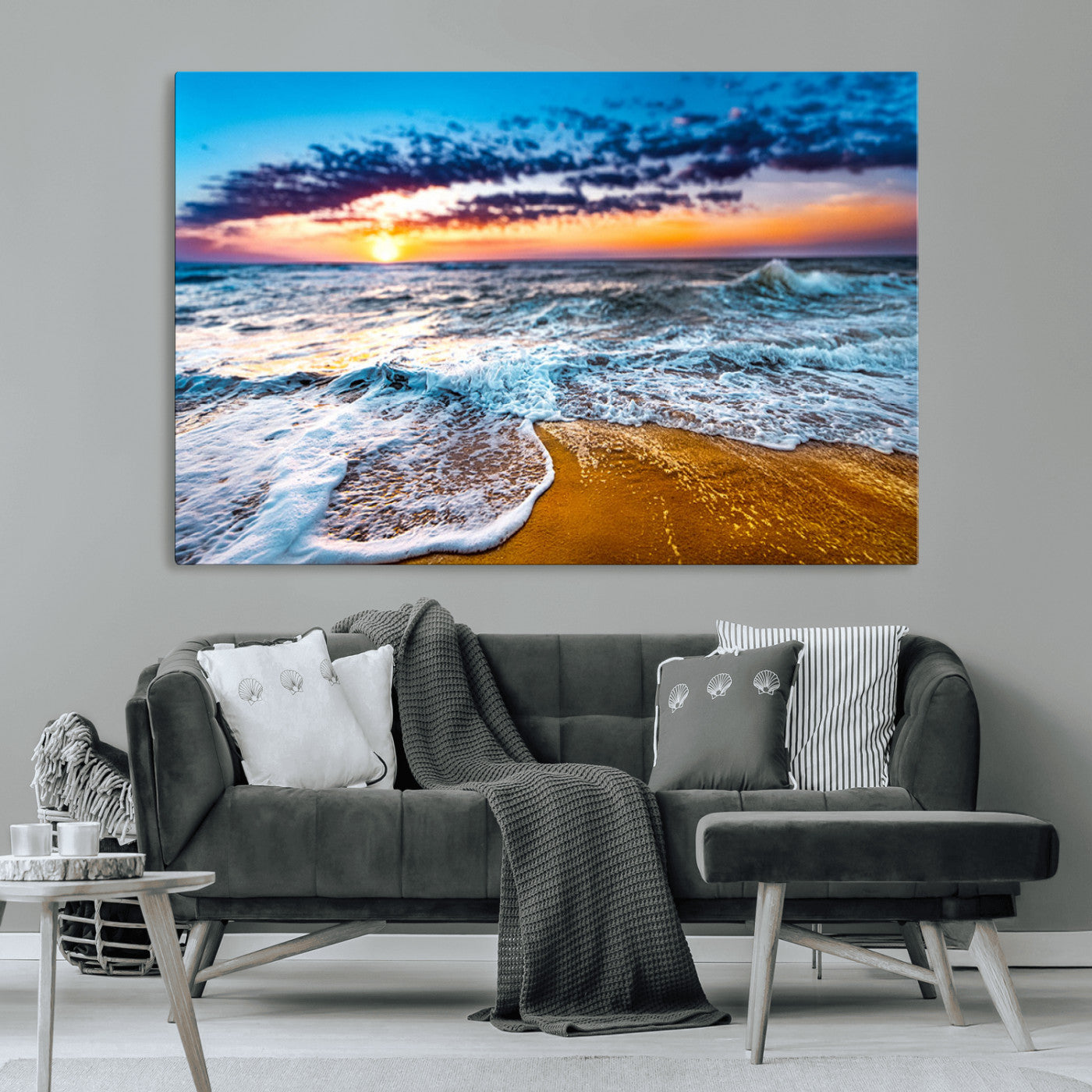 Beautiful ocean shoreline at sunset with foamy waves washing onto golden sand under a colorful sky – Wall Art Canvas Print.