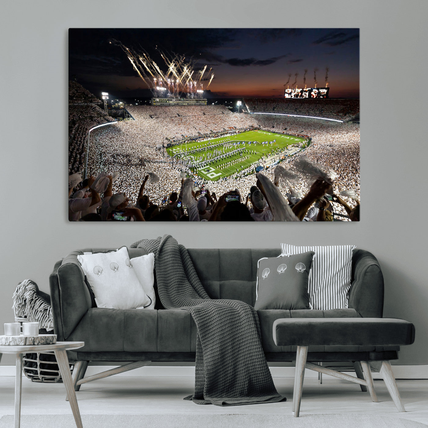 Panoramic view of a packed football stadium during a night game with a firework display and marching band performance – Wall Art Canvas Print.