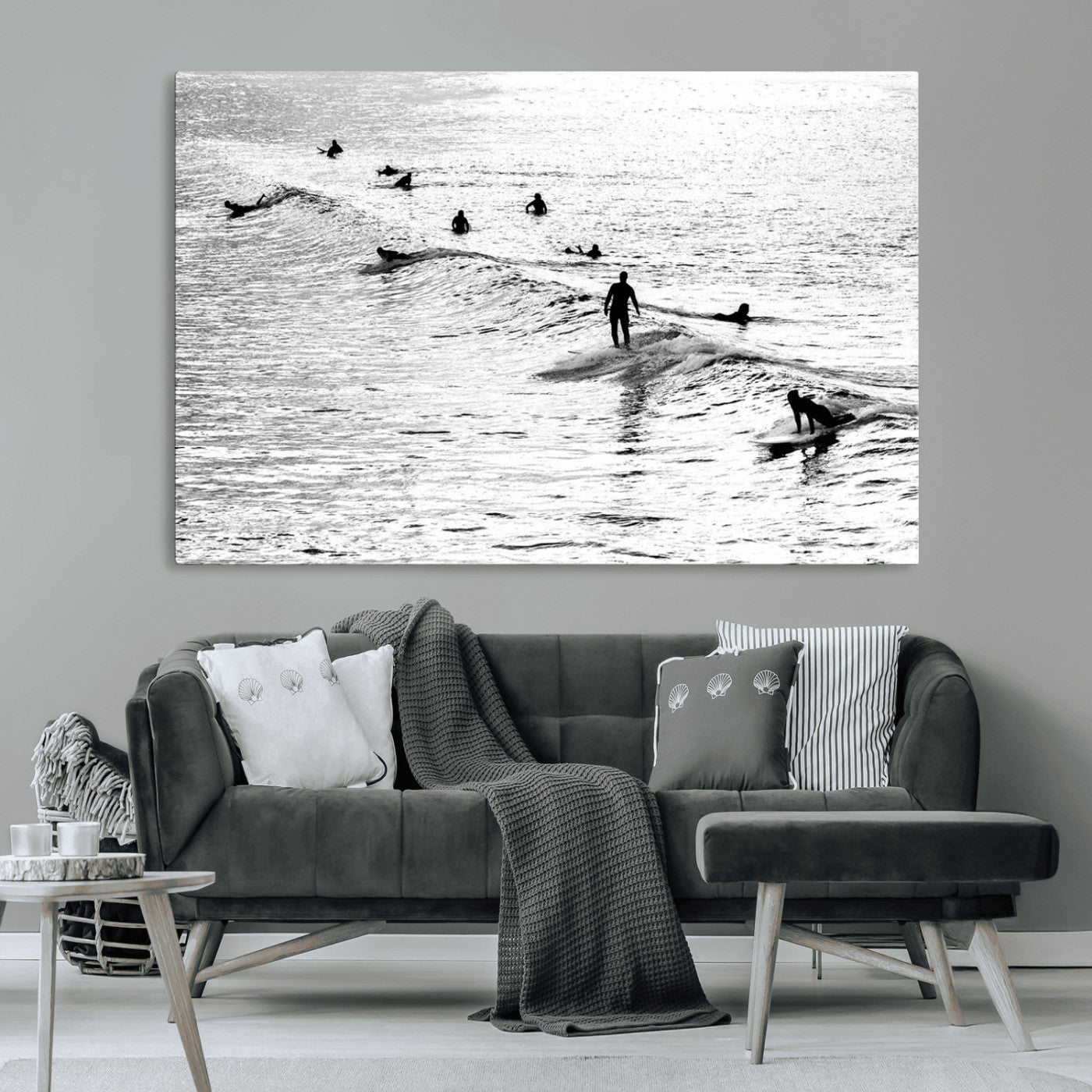 19970637-MGV-CV-36X24-Black and white artistic view of surfers riding and paddling on waves in the ocean, capturing the dynamic motion and energy of surfing