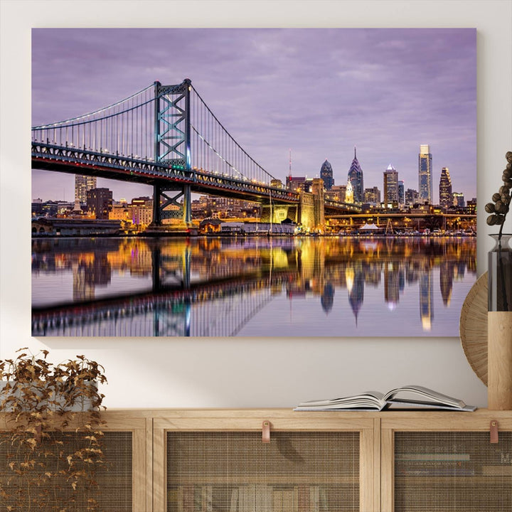 A woman holds the Philadelphia Ben Franklin Bridge Wall Art Canvas Print, a gallery-quality photo showcasing a city skyline with the bridge reflecting on the river. This stunning piece would make an excellent addition as premium canvas wall art for any home.