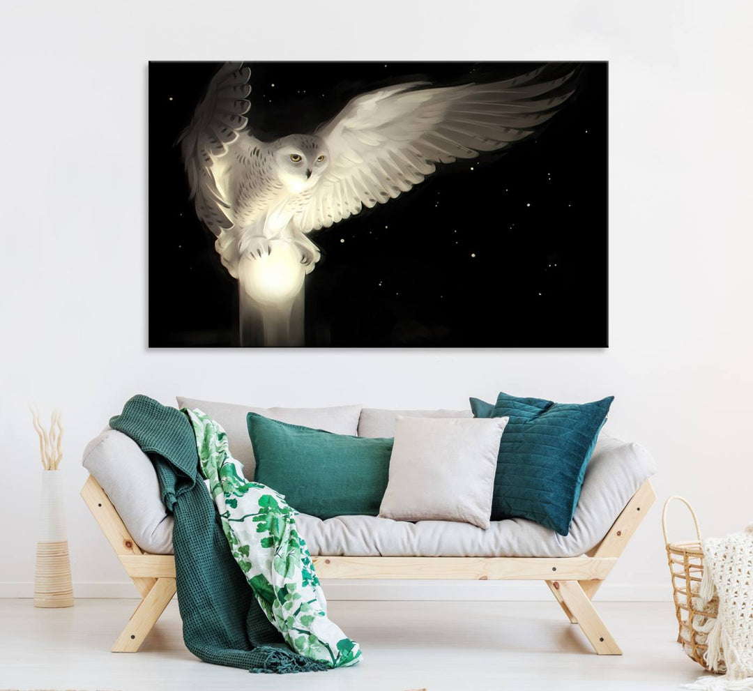 The Night Owl Art graces the wall with its depiction of a snowy owl on a glowing orb, perfect for modern decor.