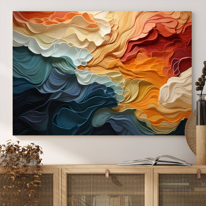 A Blue Orange Abstract Wave Wall Art Canvas Print adorns the wall. This colorful masterpiece is professionally hand-assembled to enhance any space.