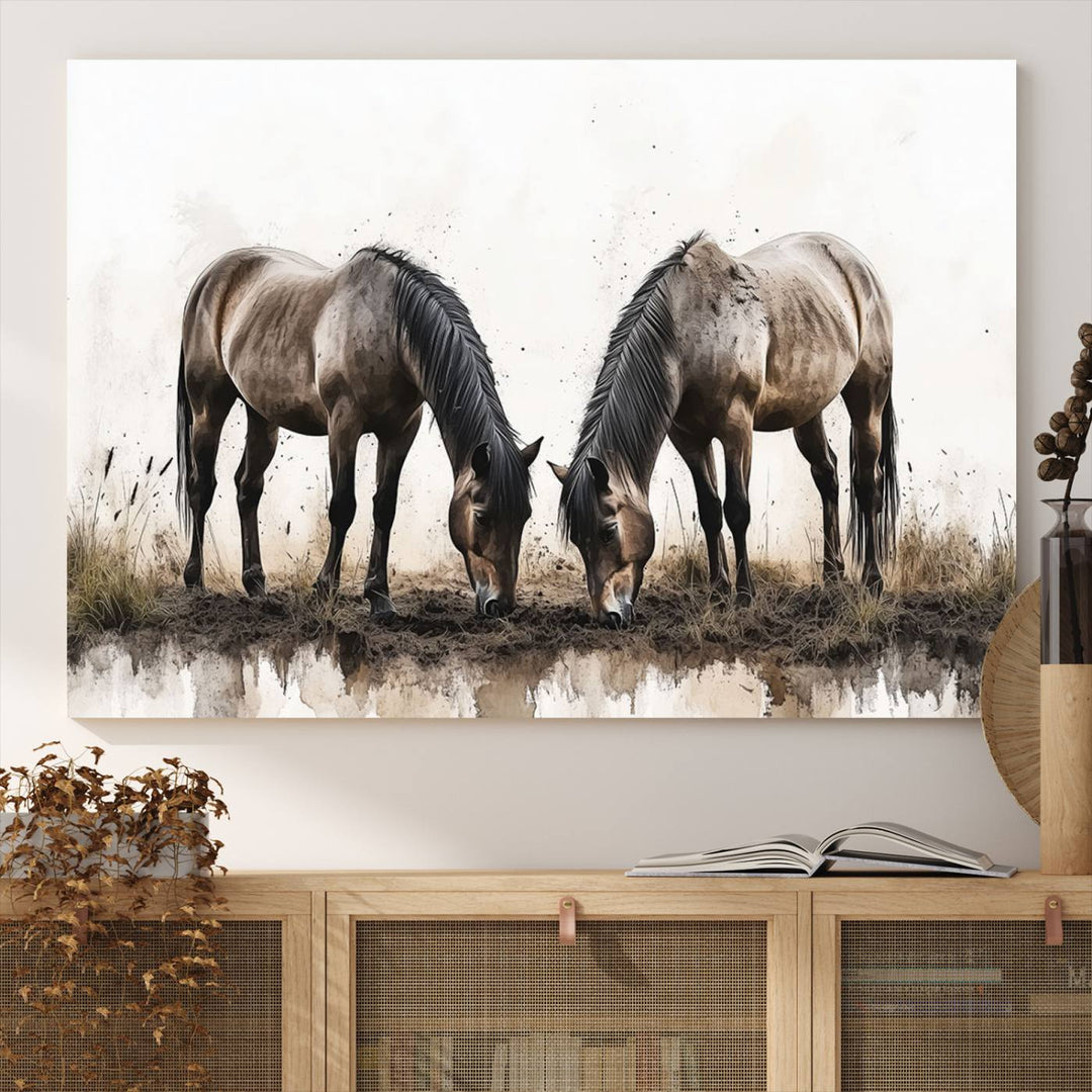 A Chinese Ink Style Horses Wall Art Canvas Print featuring two horses grazing is displayed in a modern setting.