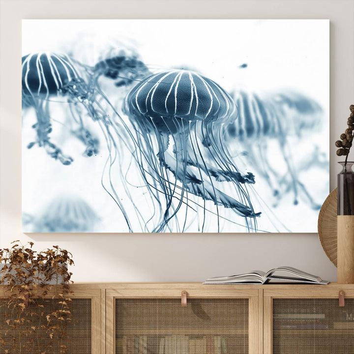 The Abstract Jellyfish Wall Art Canvas Print, a three-panel piece featuring high-resolution printing, hangs elegantly in the room, adding vibrant detail to the space.