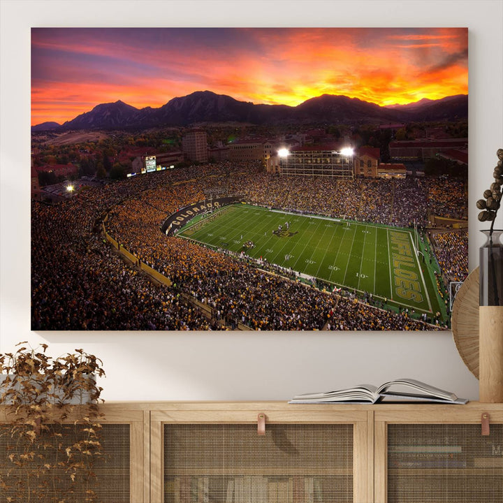 The living room showcases a lively wall art canvas print titled "Folsom Field - University of Colorado Buffaloes Football Stadium," capturing the essence of the University of Colorado.