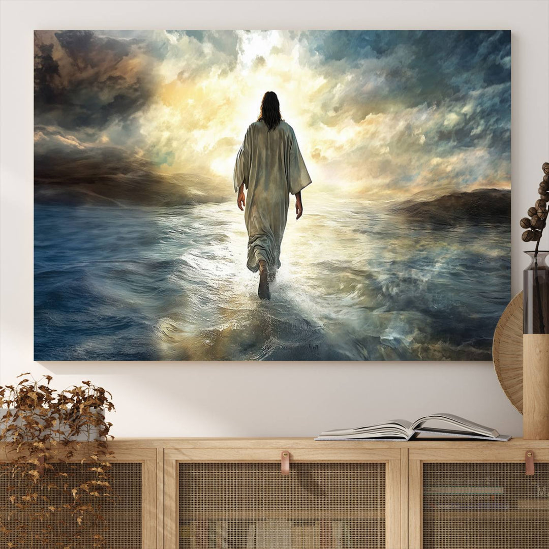 The Jesus Walking on Water Wall Art, a captivating triptych canvas print, showcases a person walking on water beneath dramatic clouds. This ready-to-hang piece seamlessly combines faith and style for your Christian home decor.