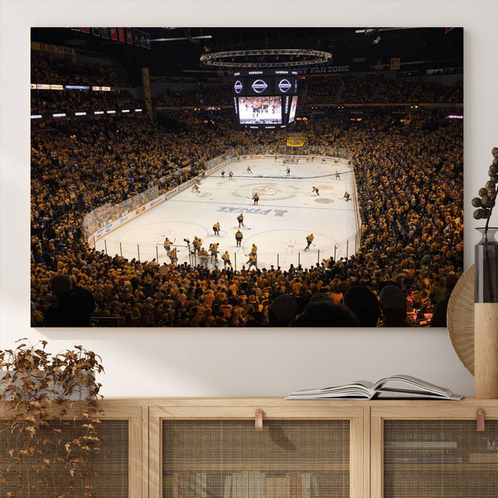 A captivating triptych canvas print, titled "Bridgestone Arena - Nashville Predators Hockey Team Print," adorns the wall. This Nashville wall art canvas print is perfect for Predators fans who appreciate sports-themed decor.