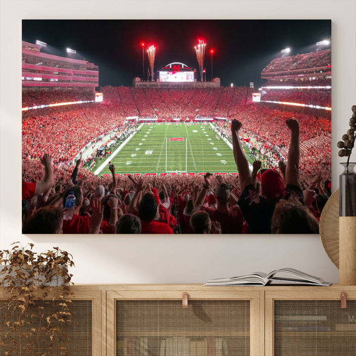 The University of Nebraska Cornhuskers Football Team Print, a vibrant three-panel canvas depicting Lincoln Memorial Stadium filled with enthusiastic fans from the end zone perspective, features a gallery-quality finish.