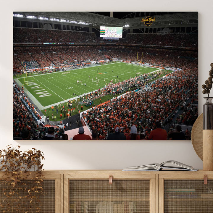 Aerial view of a Miami Hurricanes game at Hard Rock Stadium captured on canvas print, showcasing the teams on the field and fans in the stands.