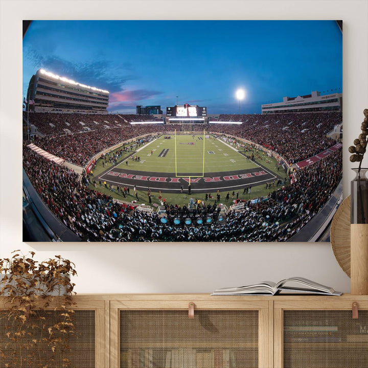 The wall art in the living room features a Texas Tech Red Raiders Football Team Print, showcasing Jones AT&T Stadium at dusk.