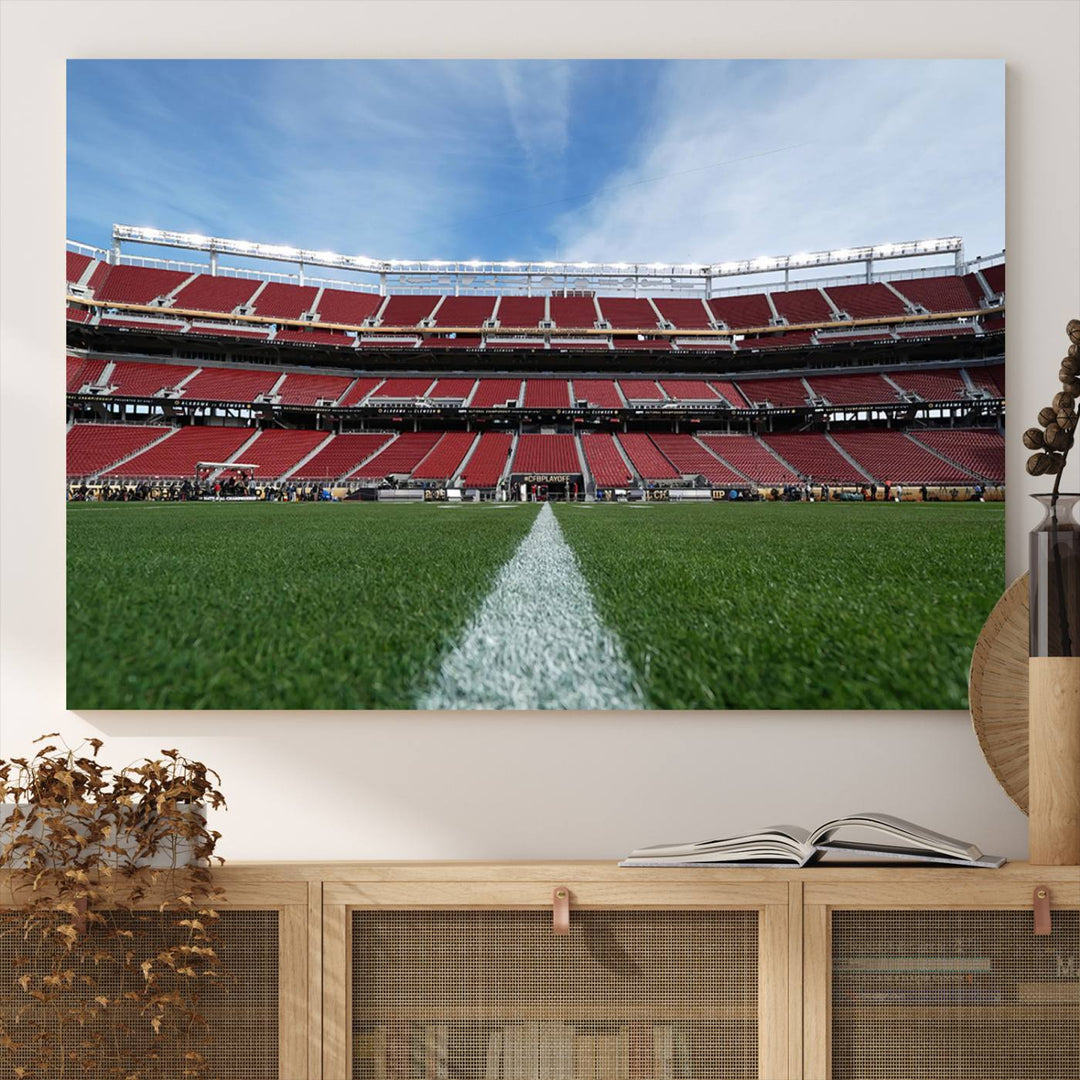 A canvas print of the University of Tulsa Golden Hurricane showcases H.A. Chapman Stadiums football field and red seats against a backdrop of a blue sky.