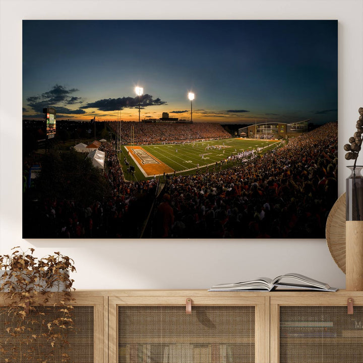 Ball State Cardinals Football Team Print - Muncie Scheumann Stadium Canvas featuring a sunset, floodlights, and lively crowd.