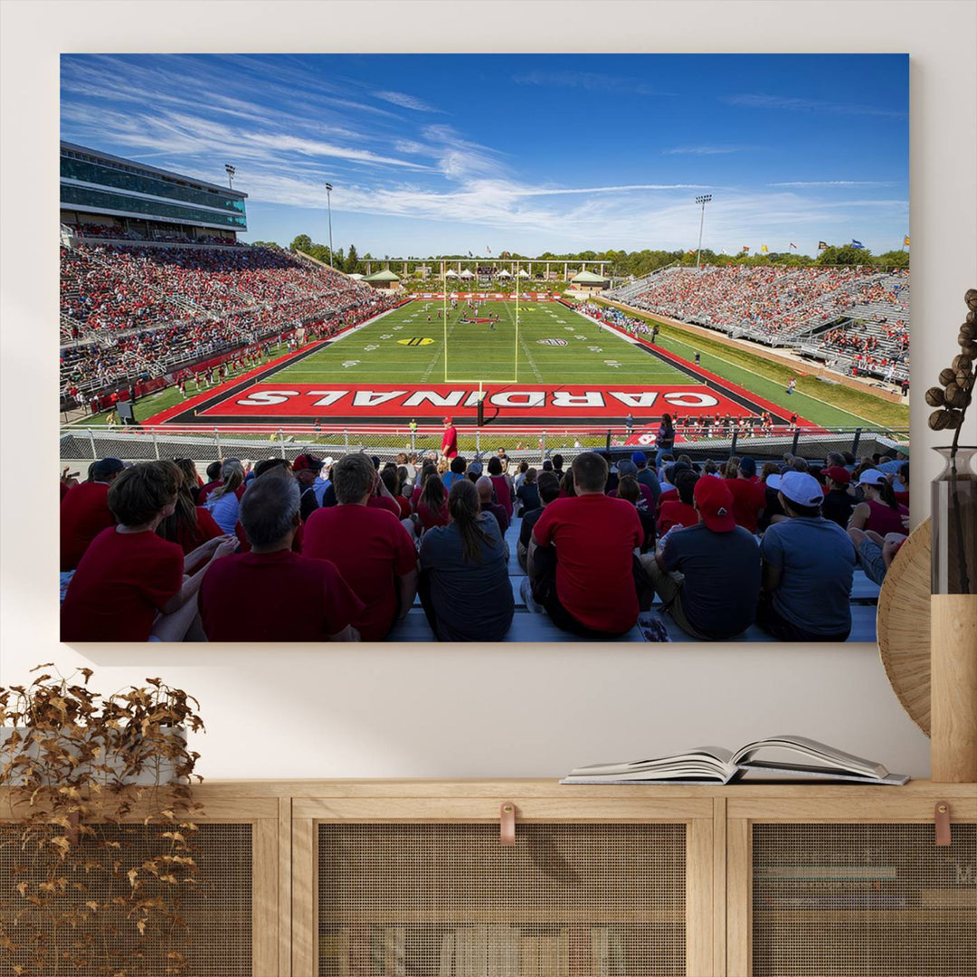 The Ball State Cardinals wall art on canvas depicts fans in red at Scheumann Stadium.