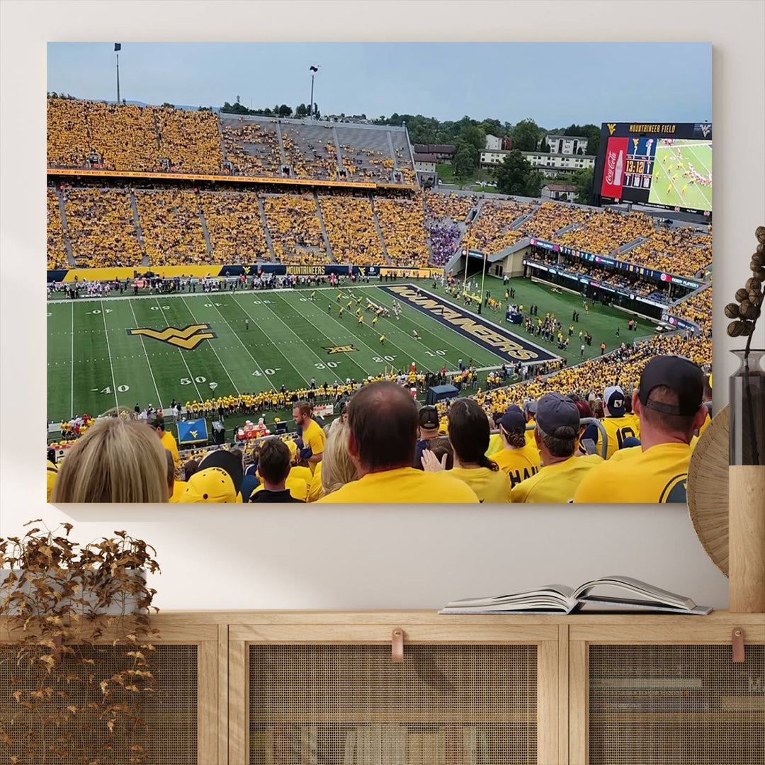 A Puskar Stadium canvas print decorates the modern living room shelf.