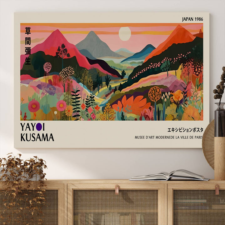 A vibrant abstract landscape by Yayoi Kusama adorns a Wabi Sabi ready-to-hang canvas print, featuring mountains and flowers.