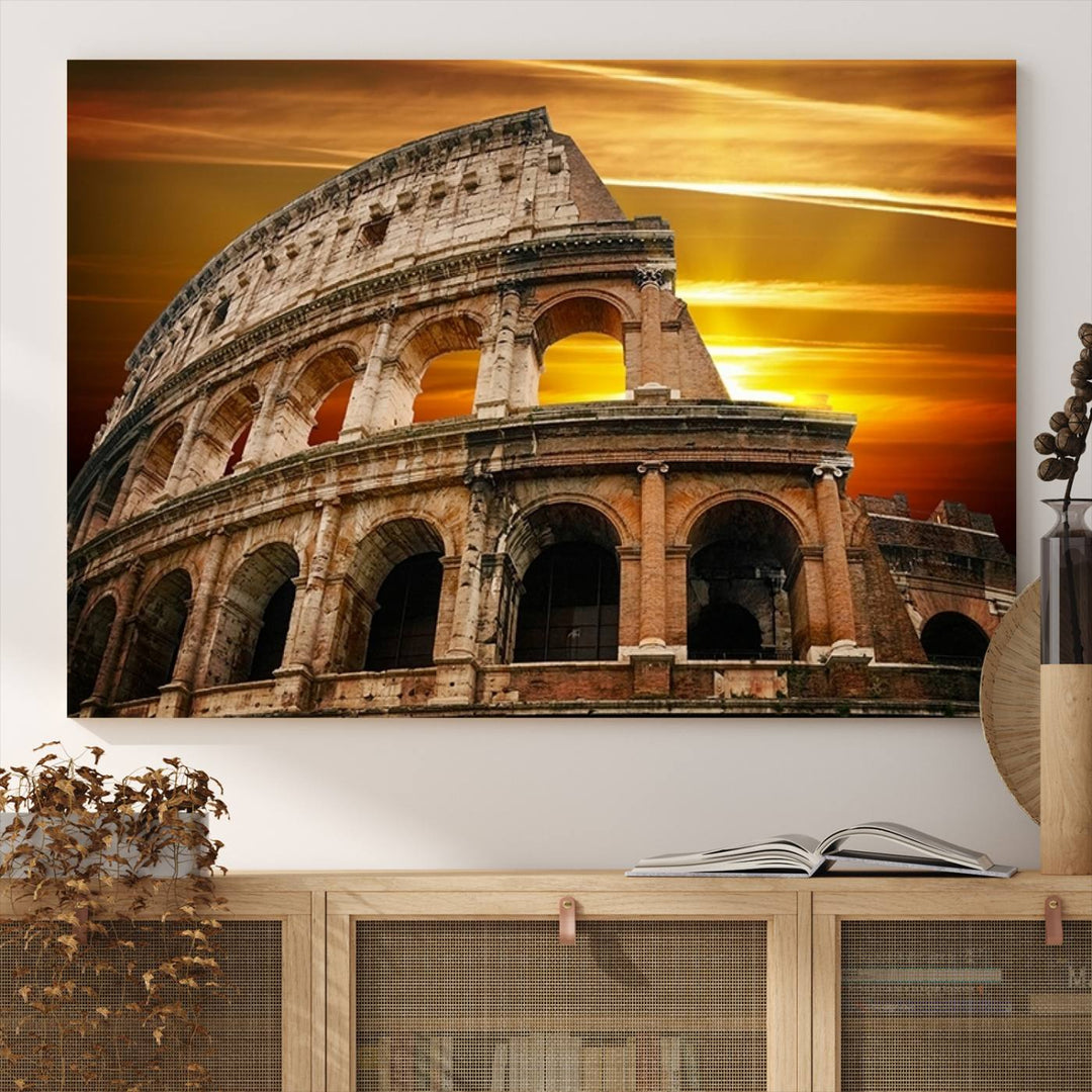 On the wall, theres a piece of art titled Colosseum with Yellow Sunset Behind, Italy.