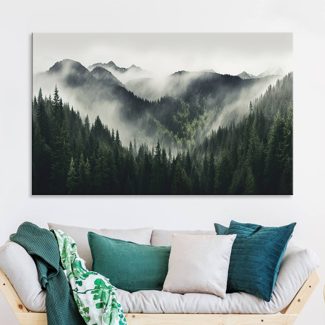 The Misty Forest Canvas Print Wall Art captures a serene misty forest scene with fog and mountains.