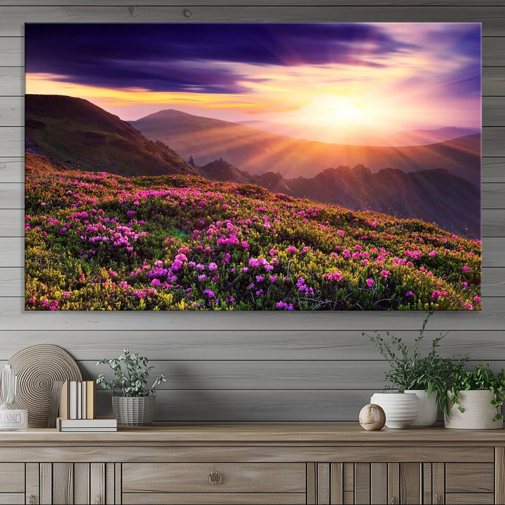 Gallery-wrapped wall art of a stunning mountain sunset and purple flowers.