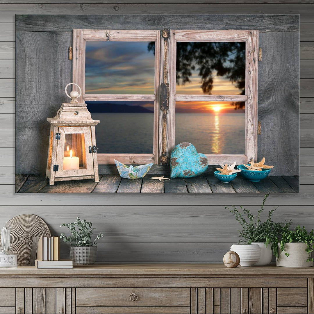 The Astonishing Sunset from the Window canvas print beautifully captures a sea view, accompanied by a lantern and starfish.