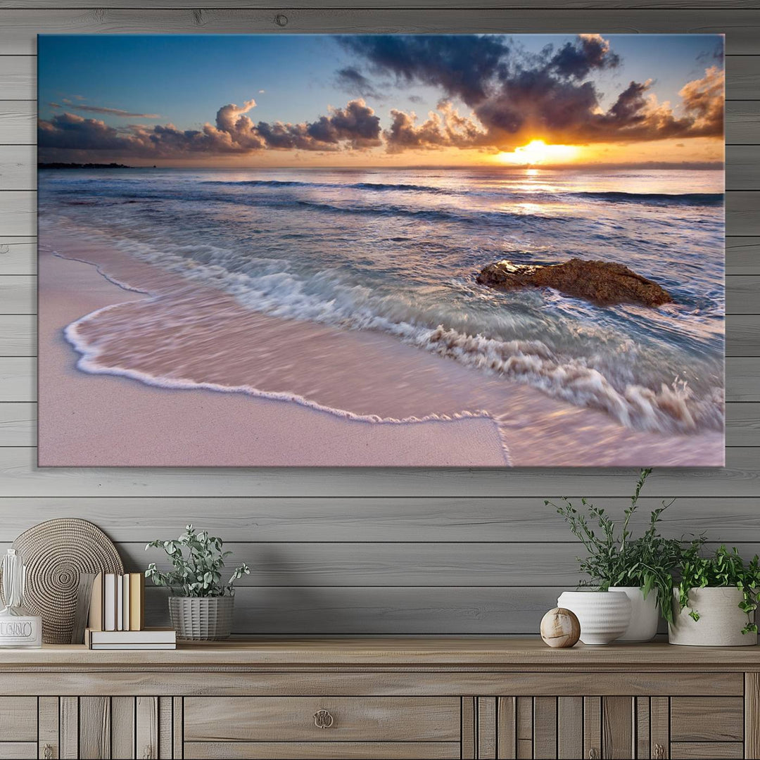 The room features a Sunset Beach Waves Canvas above the counter.