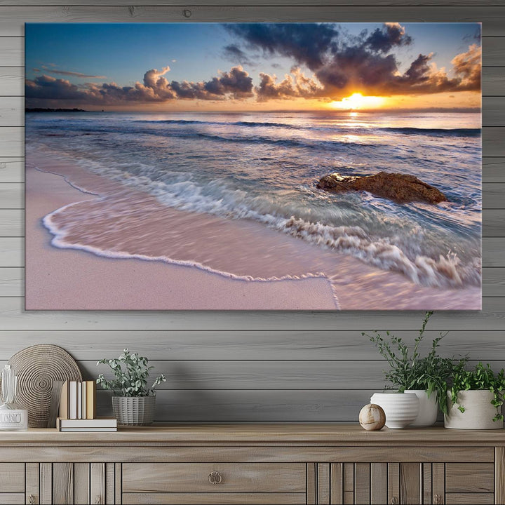 The room features a Sunset Beach Waves Canvas above the counter.