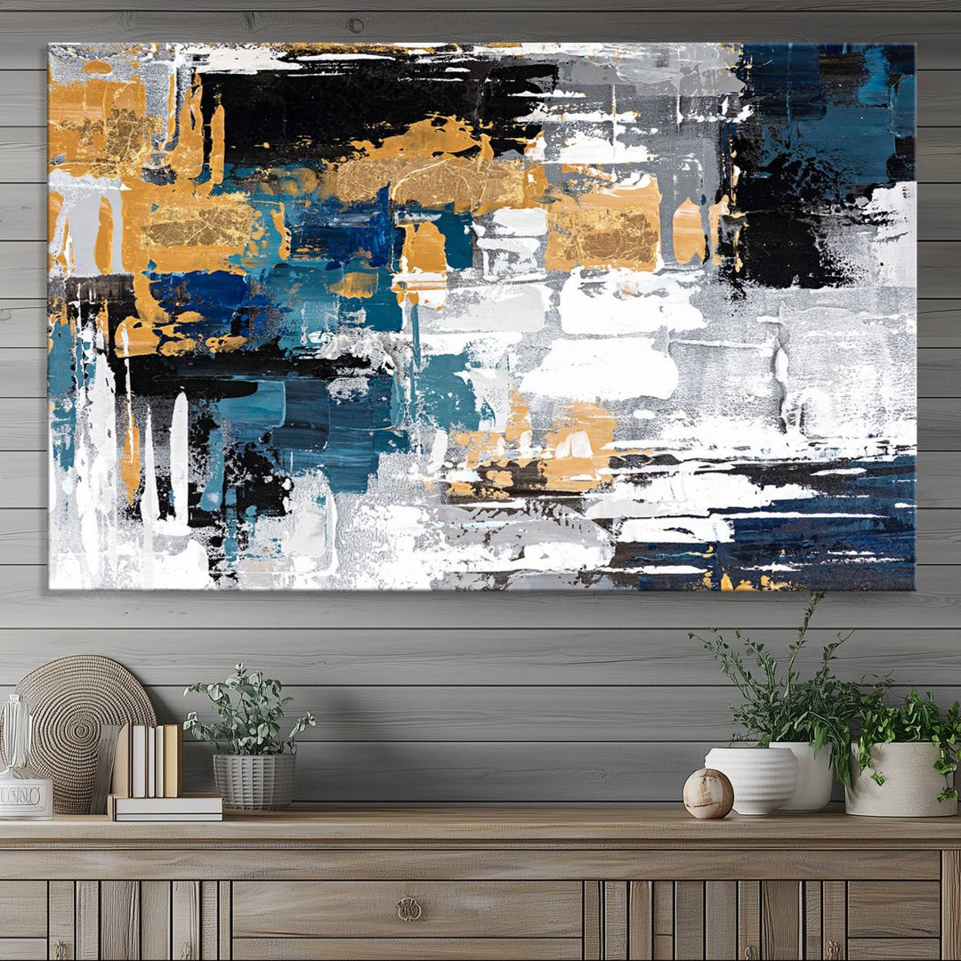 Blue and Gold Abstract Canvas Wall Art hangs prominently.