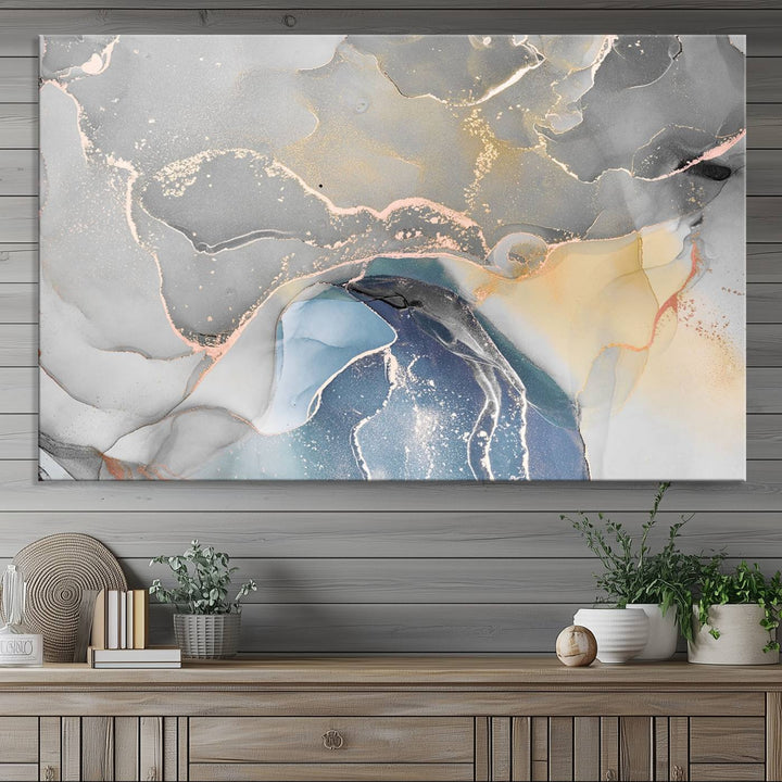 Gray Marble Fluid Effect Abstract Canvas with swirls of gray, gold, and blue.