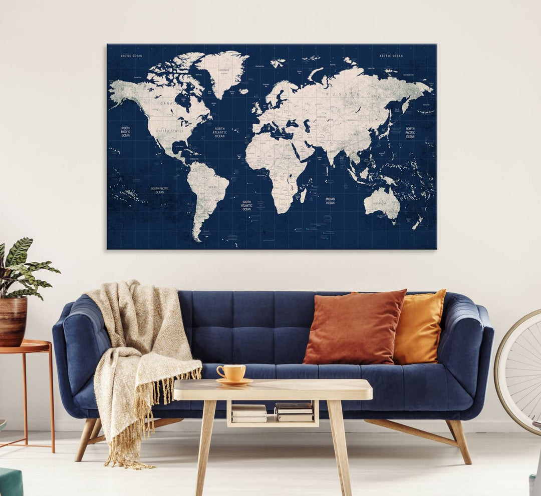 Large modern world map wall art canvas print in beige and navy; showcases a 3-panel vintage map design and is ready to hang.