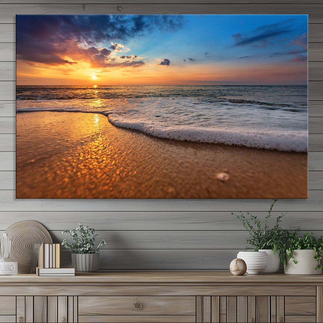 The Golden Sunset Beach Waves Triptych adds a modern coastal touch with its stunning seascape.