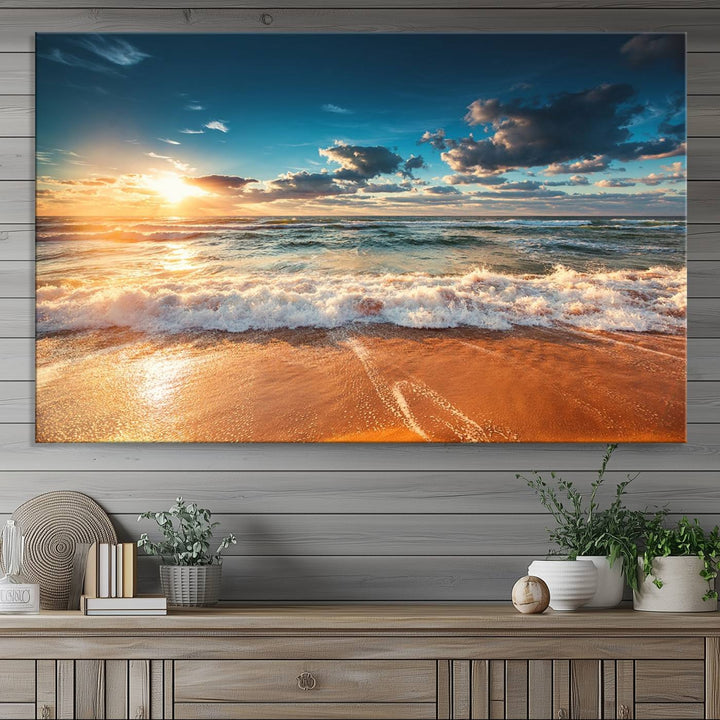 A Golden Sunset Beach Triptych Canvas Art hangs on a white wall.