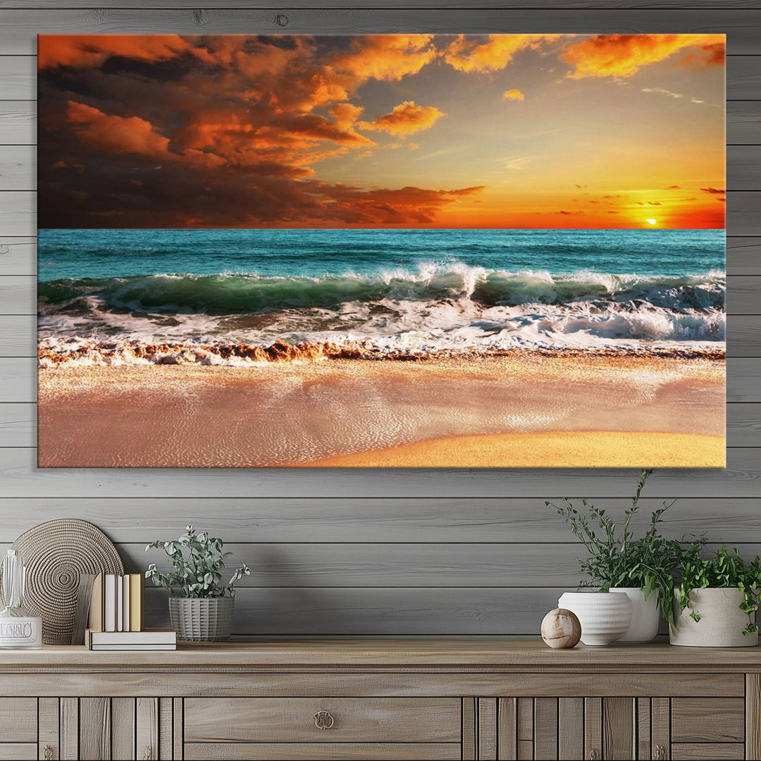 A Golden Sunset Beach triptych seascape canvas hangs on the wall.