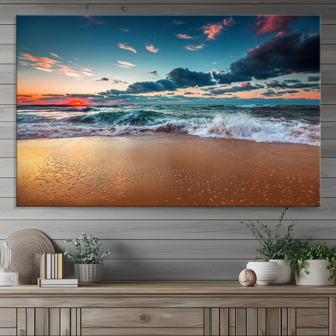 A large 3-panel sunset ocean beach canvas is displayed above the counter.