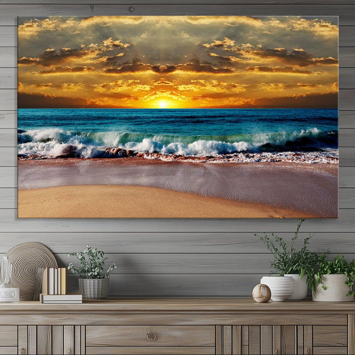 The Ocean Sunrise Over Golden Beach Waves wall art is prominently displayed, capturing the serene beauty of a beach at sunrise.