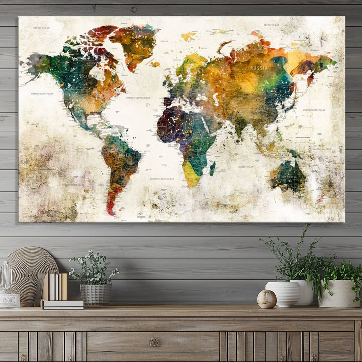 A 3-panel vintage world map canvas art is displayed.