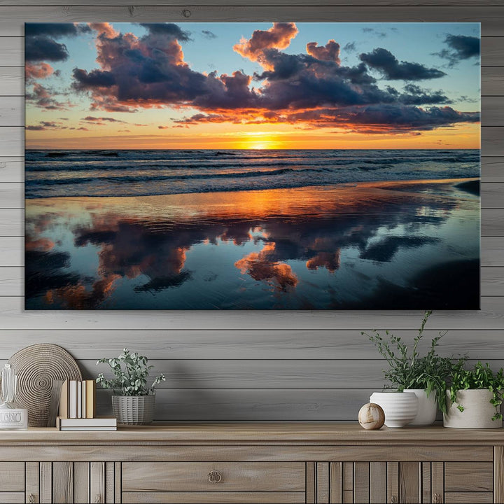 A Beach Sunset Print - Stunning Ocean Canvas Artwork adorns the wall.